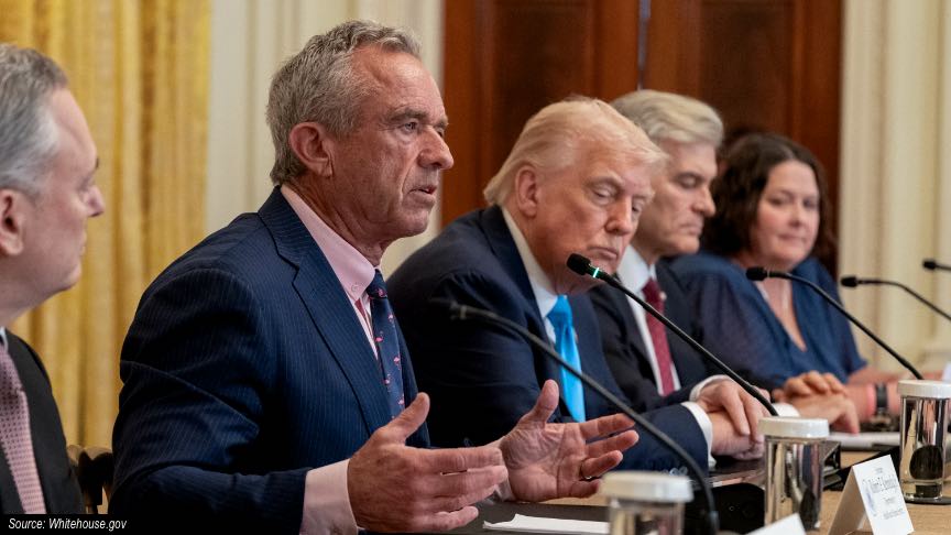 HHS Secretary Robert F. Kennedy, Jr., speaks at the White House while President Trump listens.